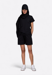 Model wearing black high-waist shorts, front view – East Vibe